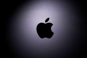 FILE PHOTO: Apple logo is seen on the MacBook in